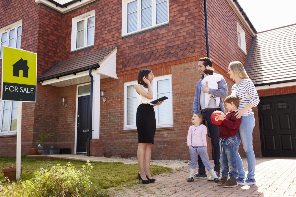 Family viewing a house.